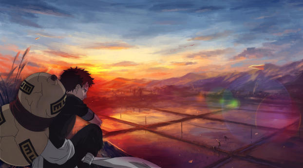 An image of Gaara from the show Naruto sitting on a cliff looking at a village
